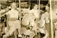 People riding the carousel in 1900.