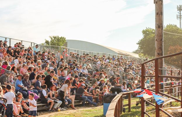 Crowd sitting in bleechers